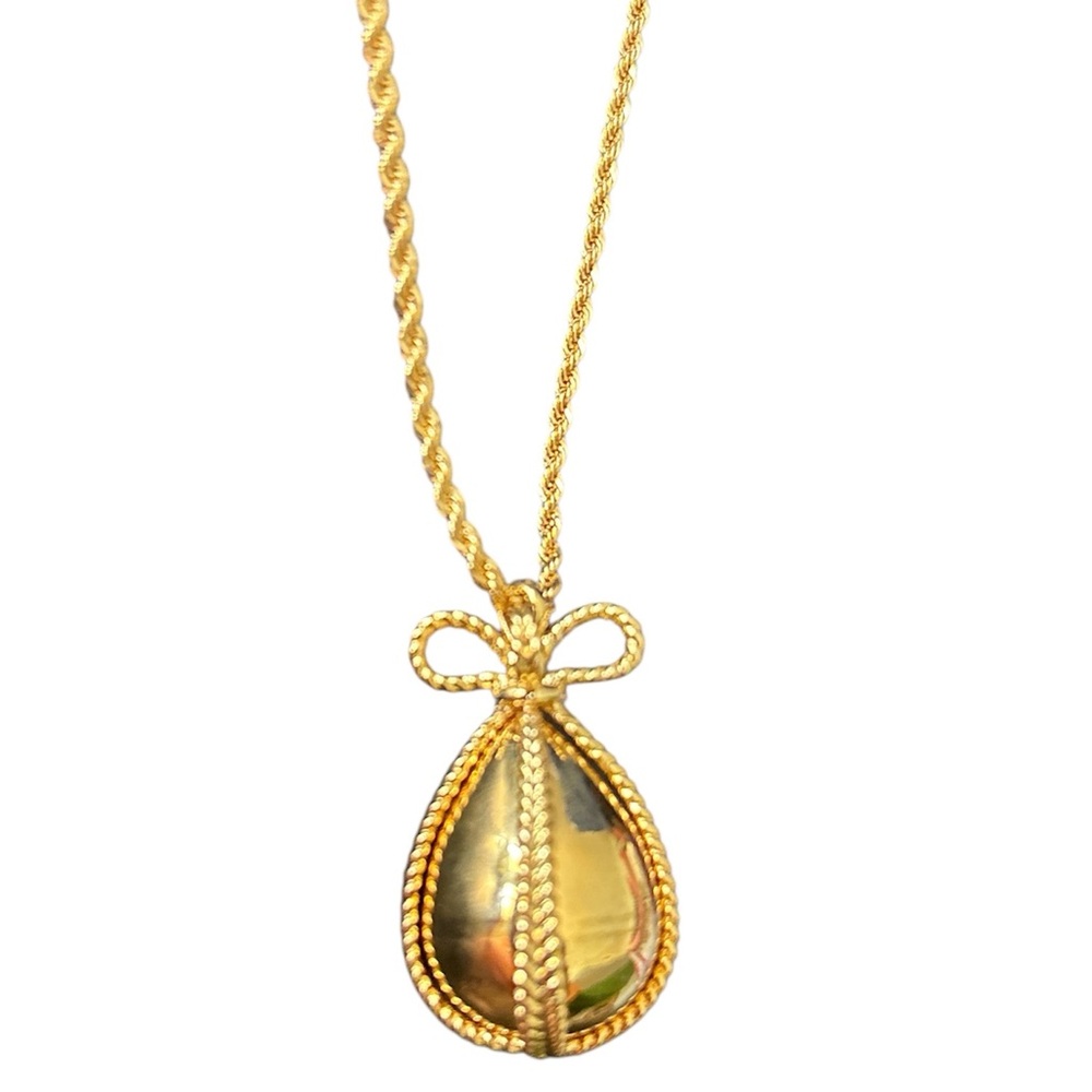 Joan Rivers Gold Ribbon Egg necklace